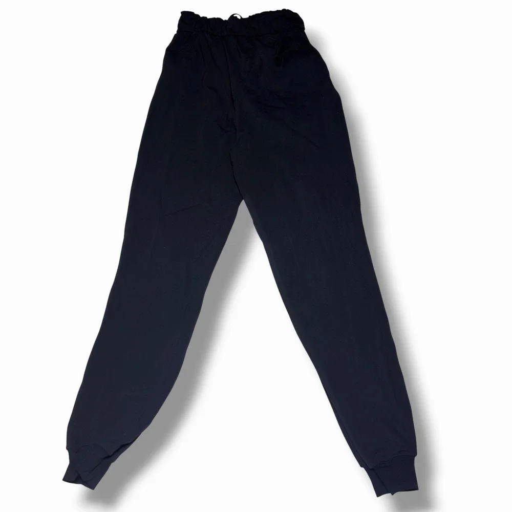Lululemon Keep Moving Joggers size 2 Black Woman Workout Running Pants